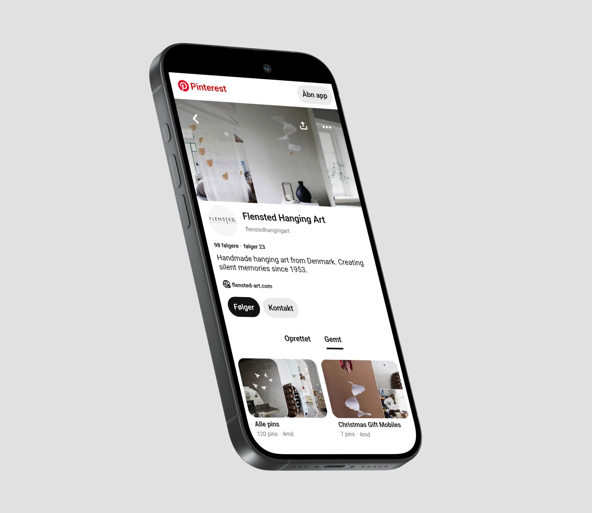 Phone displaying Flensted Hanging Arts Pinterest profile created by Tobias Madsen